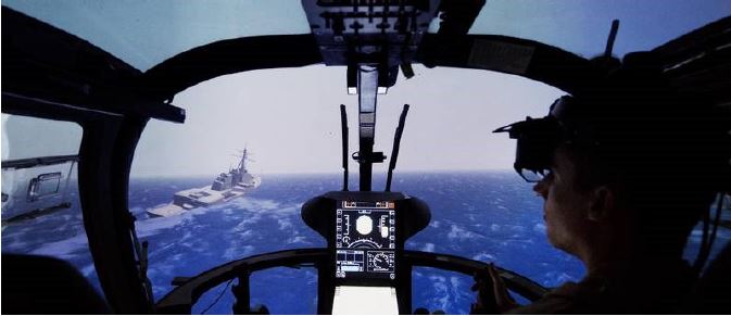 Simulation of Maritime Helicopter Operations with Pilot Assistance for Enhanced Ship Deck Landings